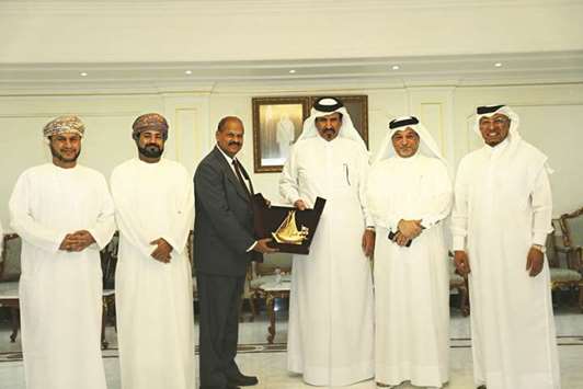 Officials from Qatar Chamber and Zubair Corporation after a business meeting held at the chamberu2019s headquarters yesterday.