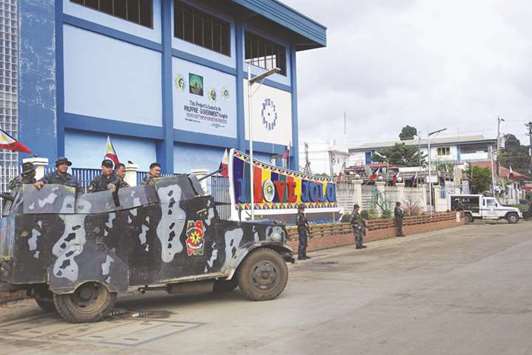 An armoured truck is positioned in front of a police station in Jolo, Sulu on the southern island of Mindanao.