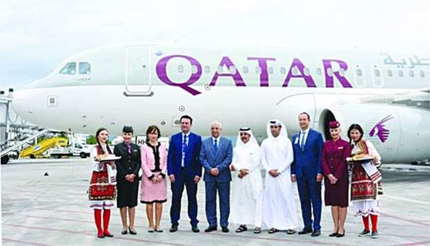 Officials are seen after Qatar Airways' inaugural flight landed at Skopje's Alexander the Great Airport.