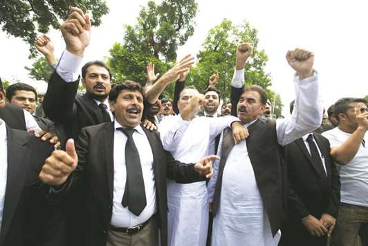 Lawyers chant slogans against Prime Minister Nawaz Sharif during Panama leaks hearing outside Supreme Court in Islamabad yesterday.