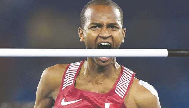 File picture of Qataru2019s Mutaz Essa Barshim reacting after clearing a jump.