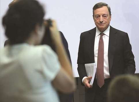 ECB president Mario Draghi departs after a news conference following the banku2019s interest rate decision, at the ECB headquarters in Frankfurt yesterday. Draghi stressed that the banku2019s governing council were unanimous both on the decision to keep its guidance unchanged and to avoid setting a precise date for a discussion of future policy, noting only that it would occur in the autumn.
