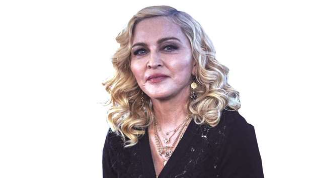 A judge halted an auction of intimate items of Madonna including a breakup letter from Tupac Shakur 
