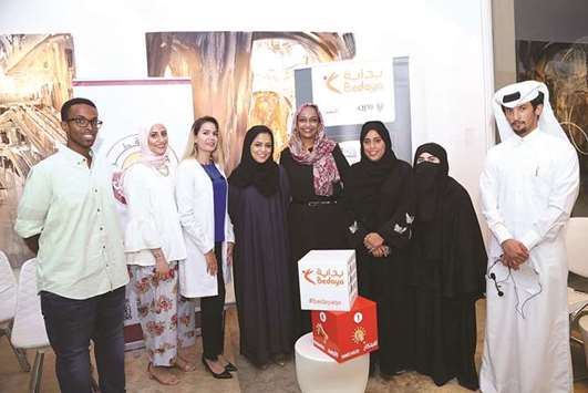 Bedaya Centre general manager Reem al-Suwaidi with participating guests of the third Mehna Cafu00e9.
