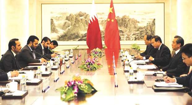 HE The Foreign Minister Sheikh Mohamed bin Abdulrahman al-Thani with his team at the talks