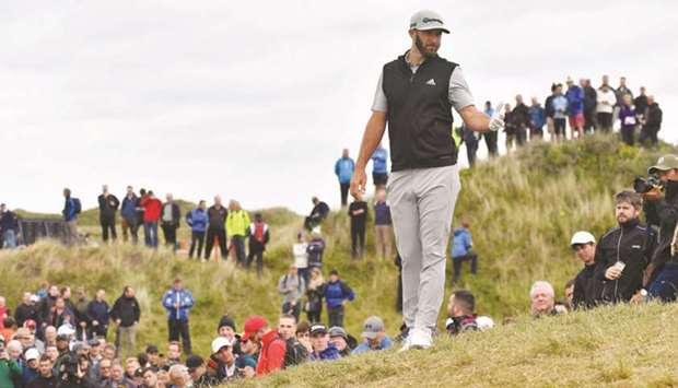 US golfer Dustin Johnson asks the gallery to move on the eighth hole during the Open Championship second round at Royal Birkdale golf course near Southport, England, yesterday. (AFP)