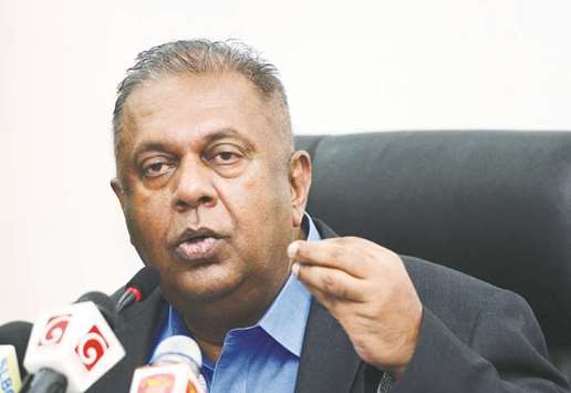 Sri Lankan Finance Minister Mangala Samaraweera addresses reporters over police attempt to u201cabductu201d a student activist, in Colombo, yesterday.
