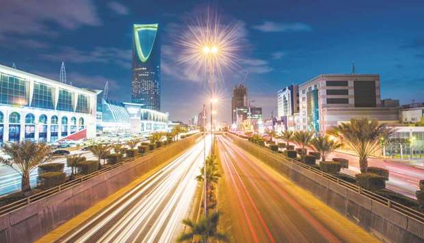 The Kingdom Tower (left) stands alongside the King Fahd highway in Riyadh. The IMF has lowered Saudiu2019s non-oil growth projection to 1.7% from 2.1% u2014 compared with actual growth of 0.2% in 2016.