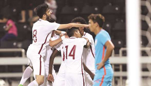 Qatar players celebrate after scoring against India yesterday during their AFC U23 Championship qualifying match at the Al Sadd stadium. Picture: Jayan Orma