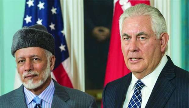 US Secretary of State Rex Tillerson with Oman's Foreign Minister Yusuf bin Alawi bin Abdullah inside the Treaty Room at the US State Department on Friday.
