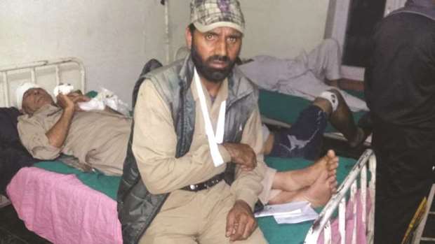 One of the policemen beaten up by soldiers in civvies in Ganderbal district recuperates at a hospital.