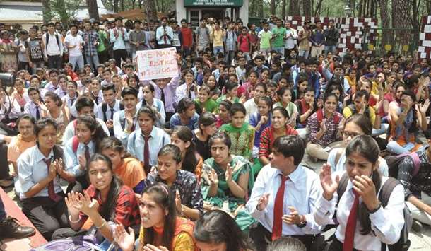 Students stage a demonstration in Dharamsala to demand justice for the 16-year-old gang-rape victim whose body was found in the forests in Kotkhai town in Shimla district on July 6.
