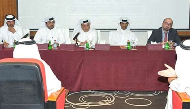 Mohamed bin Ahmed al-Obaidli and other members of the QC panel discuss the issues on food imports during a meeting with government authorities and local companies.
