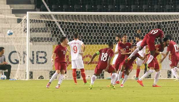 Qatar players react after scoring against Syria in their deciding AFC U-23 Championship qualifier against Syria yesterday. PICTURE: Jayan Orma