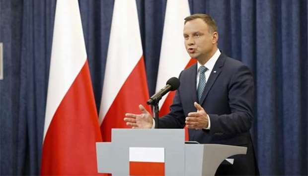 Poland's President Andrzej Duda speaks during his media announcement about Supreme Court legislation at the Presidential Palace in Warsaw on Monday.