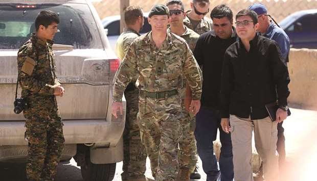 Rupert Jones, deputy commander of Combined Joint Task Force u2013 Operation Inherent Resolve (CJTF-OIR), arrives for a meeting with the Raqqa Civil Council yesterday, in the northern Syrian village of Ain Issa.