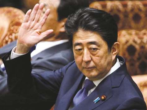 Japanu2019s Prime Minister Shinzo Abe attends a lower house budget committee session at the parliament in Tokyo.