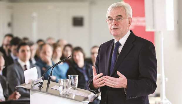 John McDonnell, finance spokesman of the UK opposition Labour party, gestures while delivering a speech in London. Last week, McDonnell chose the London Stock Exchange to invite feedback on the new tax proposals, telling leaders his party will form the next government.