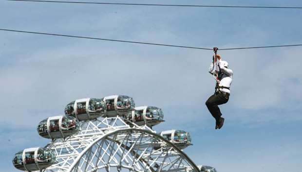 A man tries out the latest addition to Londonu2019s growing list of thrill-based vertical attractions. The new zip-wire on Londonu2019s South Bank offers thrillseekers the chance to glimpse some of the cityu2019s best sights u2013 while whizzing through the sky at 30mph. Open until October 1, it takes riders on a dizzying 738-foot journey, 100 feet above Archbishopu2019s Park. Creators Zip World claims it is the u201cbiggest and fastest city-centre zip-line in the worldu201d