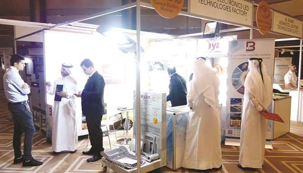 Potential clients visit the Al Bayan for Electronics & LED Technology stand. PICTURE: Peter Alagos