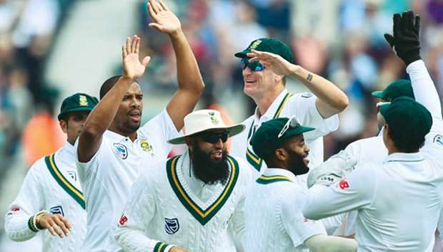 South Africau2019s Vernon Philander (second from left) celebrates the wicket of Englandu2019s Keaton Jennings with his teammates on the first day of the third Test at The Oval cricket ground in London yesterday. (AFP)
