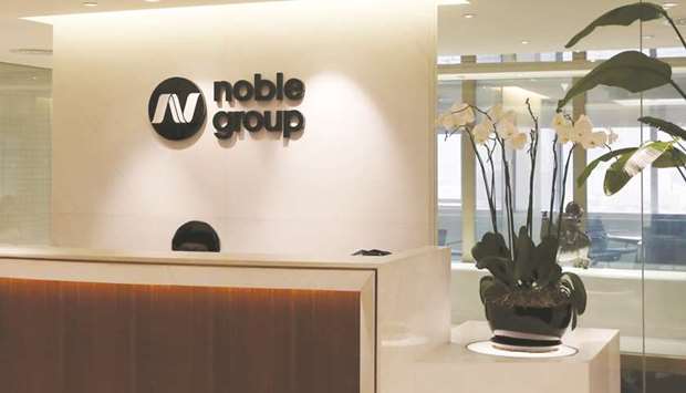 The reception of Noble Group is seen at its headquarters in Hong Kong. Announcing a $1bn asset disposal plan as it tackles its debts, Noble said in a statement it would sell its US gas and power business to Mercuria for $248mn.