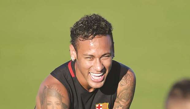 Barcelonau2019s Brazilian forward Neymar takes part in a training session at Barry University in Miami, Florida.