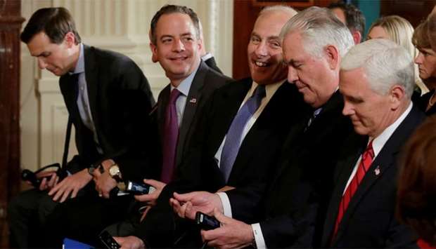 White House Senior Advisor Jared Kushner, Chief of Staff Reince Priebus, Secretary of Homeland Security John Kelly, Secretary of State Rex Tillerson and Vice President Mike Pence (L to R) take their seats as they arrive for a joint news conference