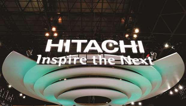 A logo of Hitachi is seen at the Combined Exhibition of Advanced Technologies in Chiba, Japan. The company is in discussions on selling a share in Horizon Nuclear Power with a number of parties before it makes a final investment decision on the plants in 2019, an official said.