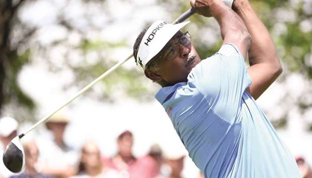 Vijay Singh hits his shot on the first hole during the third round of the RBC Canadian Open golf tournament at Glen Abbey Golf Club in Oakville, Ontario, Canada, yesterday. (USA TODAY Sports)