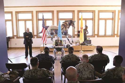 Hiroshi, centre, speaks to a group of Navy Seabees at the Gallup Cultural Center on June 15, 2017 in Gallup.