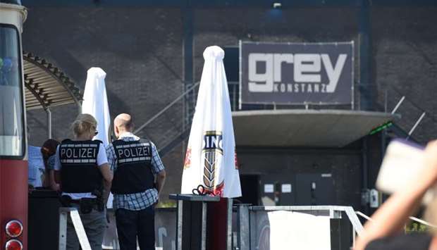 Police stand in front of the disco Club Grey in the southern German town of Konstanz