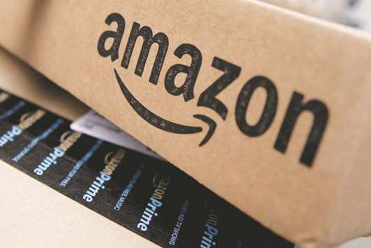 Amazon boxes stacked for delivery.