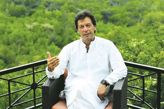 Imran Khan, chairman of the Pakistan Tehreek-e-Insaf (PTI) political party, speaks with a Reuters correspondent during an interview at his home in the hills of Bani Gala on the outskirts of Islamabad.