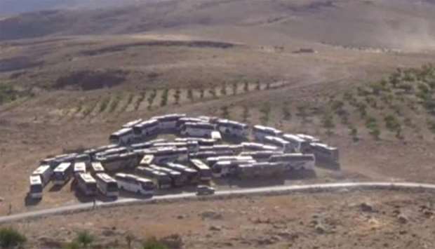 buses that will transfer Nusra Front militants at an unidentified location at the Lebanese-Syrian border