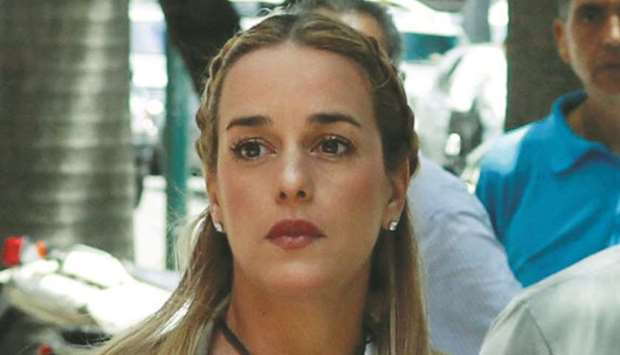 Lilian Tintori, wife of jailed opposition leader Leopoldo Lopez, arrives for a meeting of the Venezuelan coalition of opposition parties in Caracas.