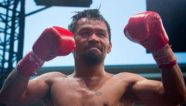 Manny Pacquiao of the Philippines reacts after his defeat to Jeff Horn of Australia