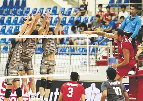 Action from the match between Qataru2019s Al Arabi (in red) and Sarmayeh Bank of Iran (in grey) during their semi-final yesterday.