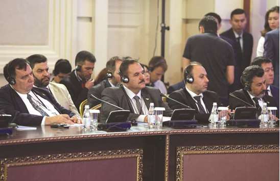 Members of the Syrian opposition delegation attend the round on Syria peace talks in Astana, Kazakhstan, yesterday.