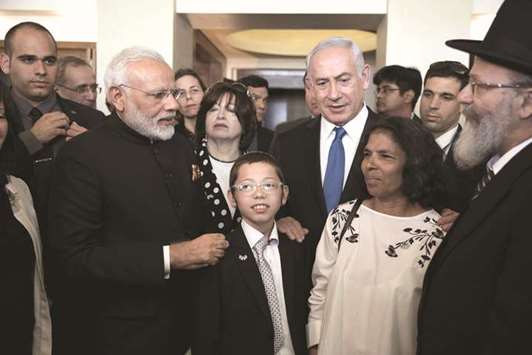 Prime Minister Narendra Modi meets Moshe Holtzberg whose parents were killed during the November 2008 attacks in Mumbai at Nariman House.