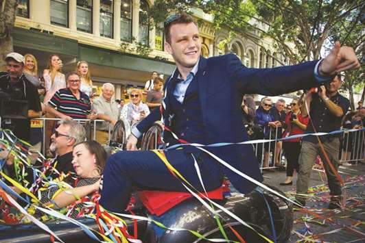 New World Boxing Organisation welterweight title holder Jeff Horn participates in a victory parade in Brisbane. (AFP)