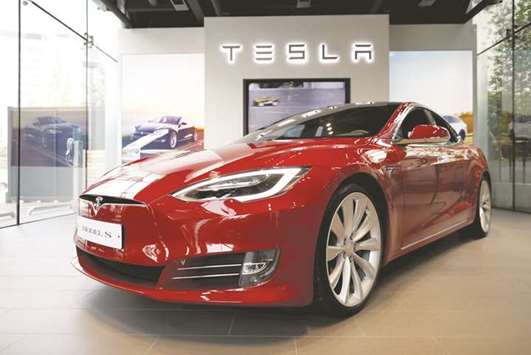 A Tesla Model S electric car is seen at its dealership in Seoul, South Korea. In another setback for the high-flying carmaker, Model S once again fell short of the top rating in a key crash test, an independent testing agency said yesterday.