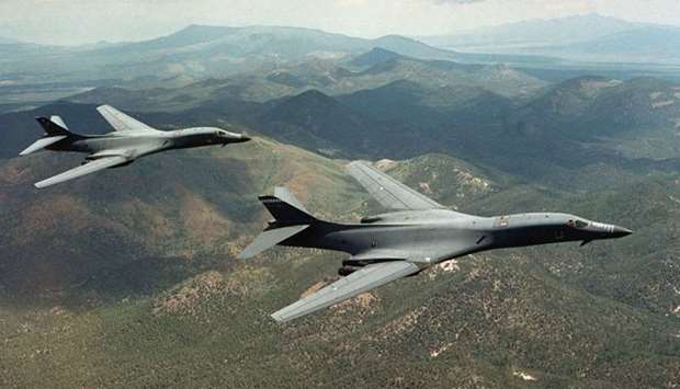 A pair of B-1B Lancer bombers soar over Wyoming in an undated file photo. File photo.