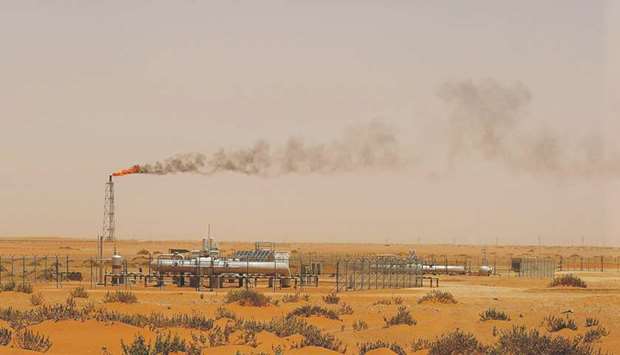 A picture taken on June 23, 2008 shows a flame from a Saudi Aramco oil facility known as u201cPump 3u201d in the desert near the oil-rich area of Khouris, 160km east of Riyadh. While the kingdom is still cutting slightly deeper than required u2013 as it has done all year u2013 it increased production in June to the highest level since the accord began, boosted exports by even more, and this week cut prices for Asian buyers.