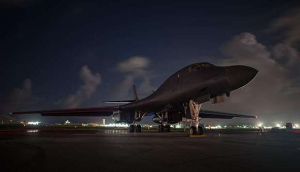 A US Air Force B-1B Lancer assigned to the 9th Expeditionary Bomb Squadron, deployed from Dyess Air Force Base, Texas, sits at Andersen Air Force Base in Guam on July 7, 2017 before conducting a sequenced bilateral mission with South Korean F-15 and Koku Jieitai (Japan Air Self-Defense Force) F-2 fighter jets