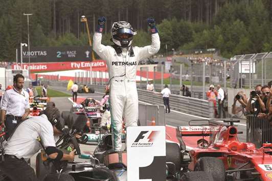 Mercedesu2019 Finnish driver Valtteri Bottas celebrates after winning the Formula One Austria Grand Prix at the Red Bull Ring in Spielberg, Austria, yesterday.
