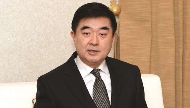 Chinese ambassador Li Chen speaking at a press conference in Doha.