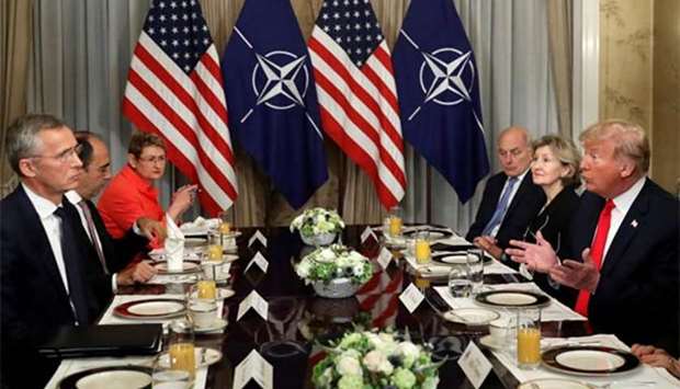 President Donald Trump holds a breakfast meeting with Nato Secretary General Jens Stoltenberg at the Nato summit in Brussels on Wednesday.