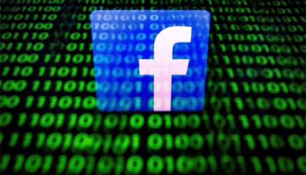 Facebook logo is displayed on a screen. Britain's ICO plans to issue Facebook with the maximum available fine for breaches of the Data Protection Act.