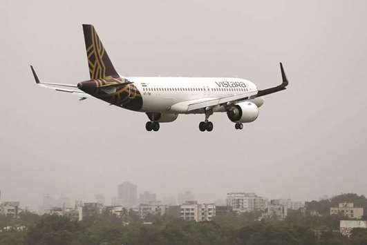 A Vistara Airbus A320 passenger aircraft prepares to land at Chhatrapati Shivaji International airport in Mumbai. The airline said it has placed firm orders for six Boeing 787 jets and 13 Airbus A320neos valued at $3.1bn at list prices